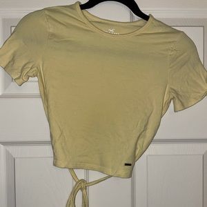 Holister size sm yellow short sleeve crop with tie strings for cute lace style